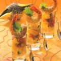 Gamba`s met mangotartaar geserveerd in een mooi[...]