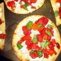 Pizza met zongedroogde tomaatjes, paprika en[...]