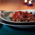 Carpaccio van serranoham en tomaat