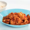 Indiase curry van karbonades met bloemkool