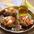 Gepofte zoete aardappel met feta,chillipeper en[...]
