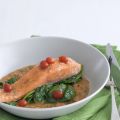 Gepocheerde zalm op spinazie