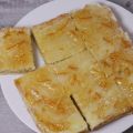 Sinaasappelkoek gevuld met amandelspijs
