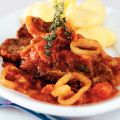 Karbonade met uien-tomatenjus