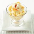 Roomijscoupe met banaan en slagroom