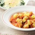Perline met rauwe ham en tomatensaus