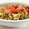 Vegetarische amandelpaella met gedroogde tomaten