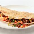 Gegratineerde tortilla's met Mexicaans gehakt