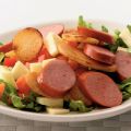 Lauwwarme andijviesalade met rookworst