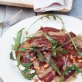 Carpaccio met rucola