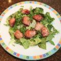 Salade met lauwwarme kaas-ham buideltjes
