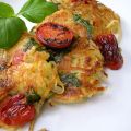 Röstikoekjes met tomaat en rucola